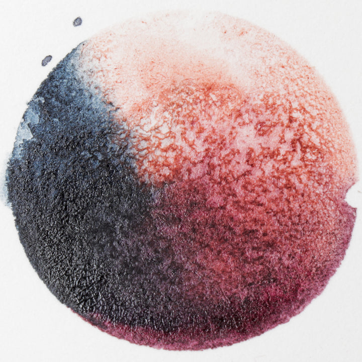 painting of circle with watercolors from natural dyes and pigments