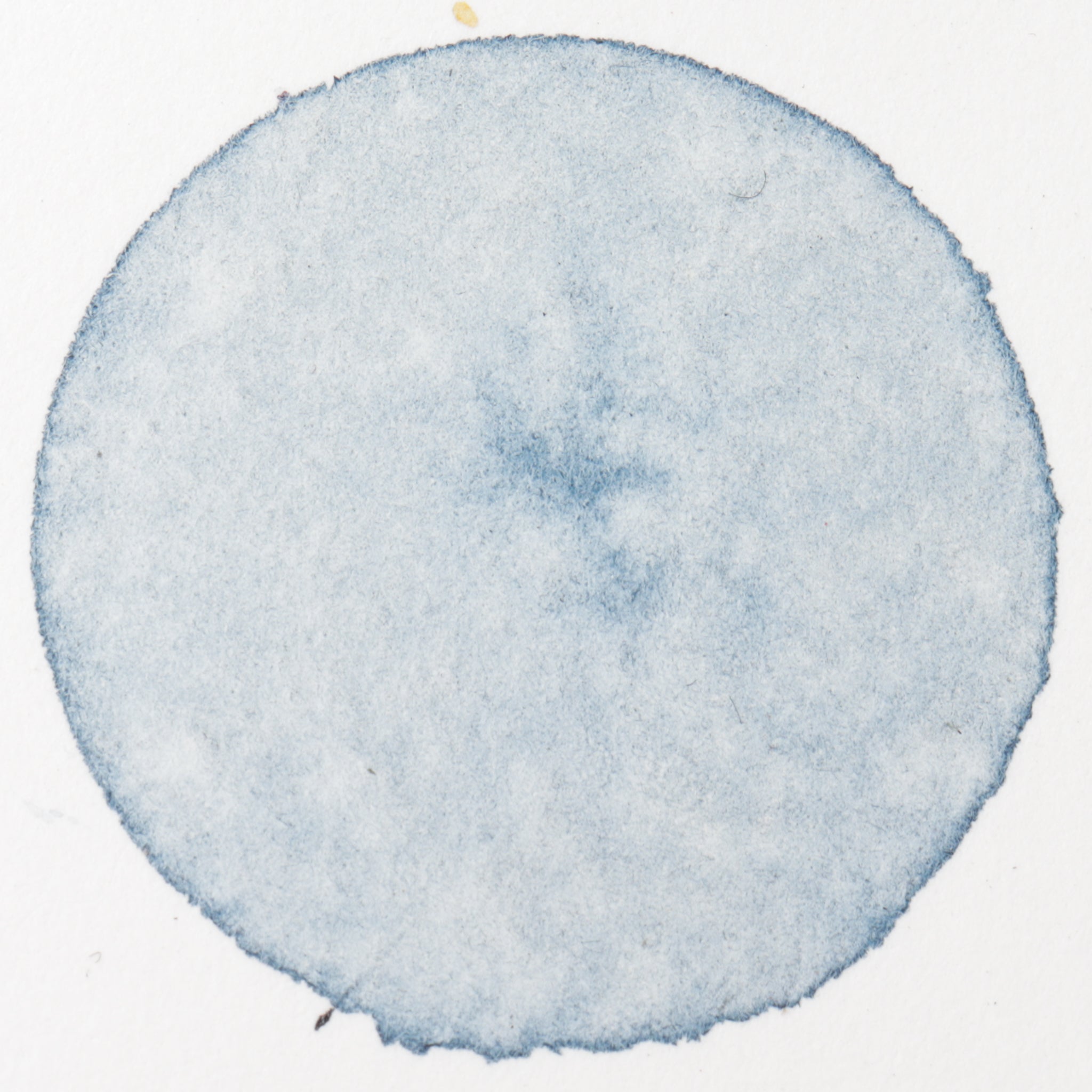 painting of circle with watercolors from natural dyes and pigments