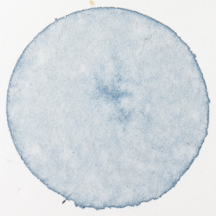 painting of circle with watercolors from natural dyes and pigments