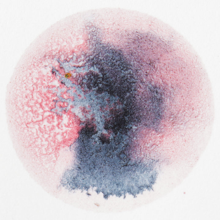 painting of circle with watercolors from natural dyes and pigments